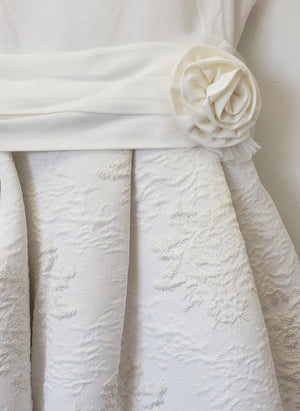 Sleeveless ivory rosette dress