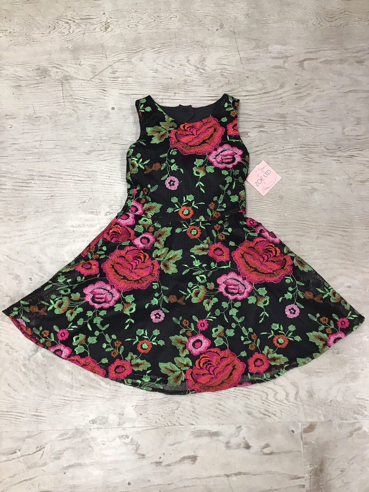 Elegant rosette dress by Zoe Ltd.