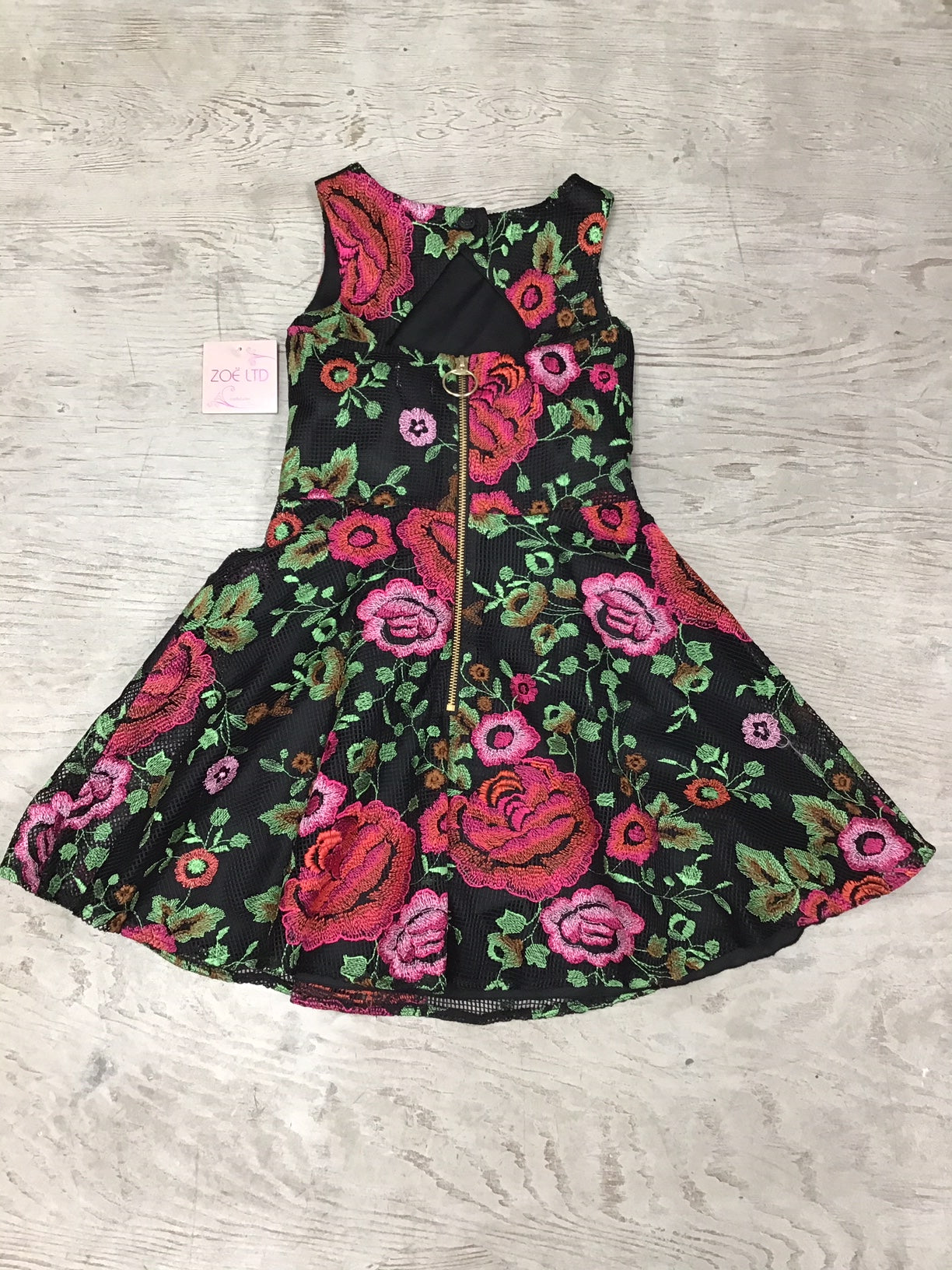 Elegant rosette dress by Zoe Ltd.